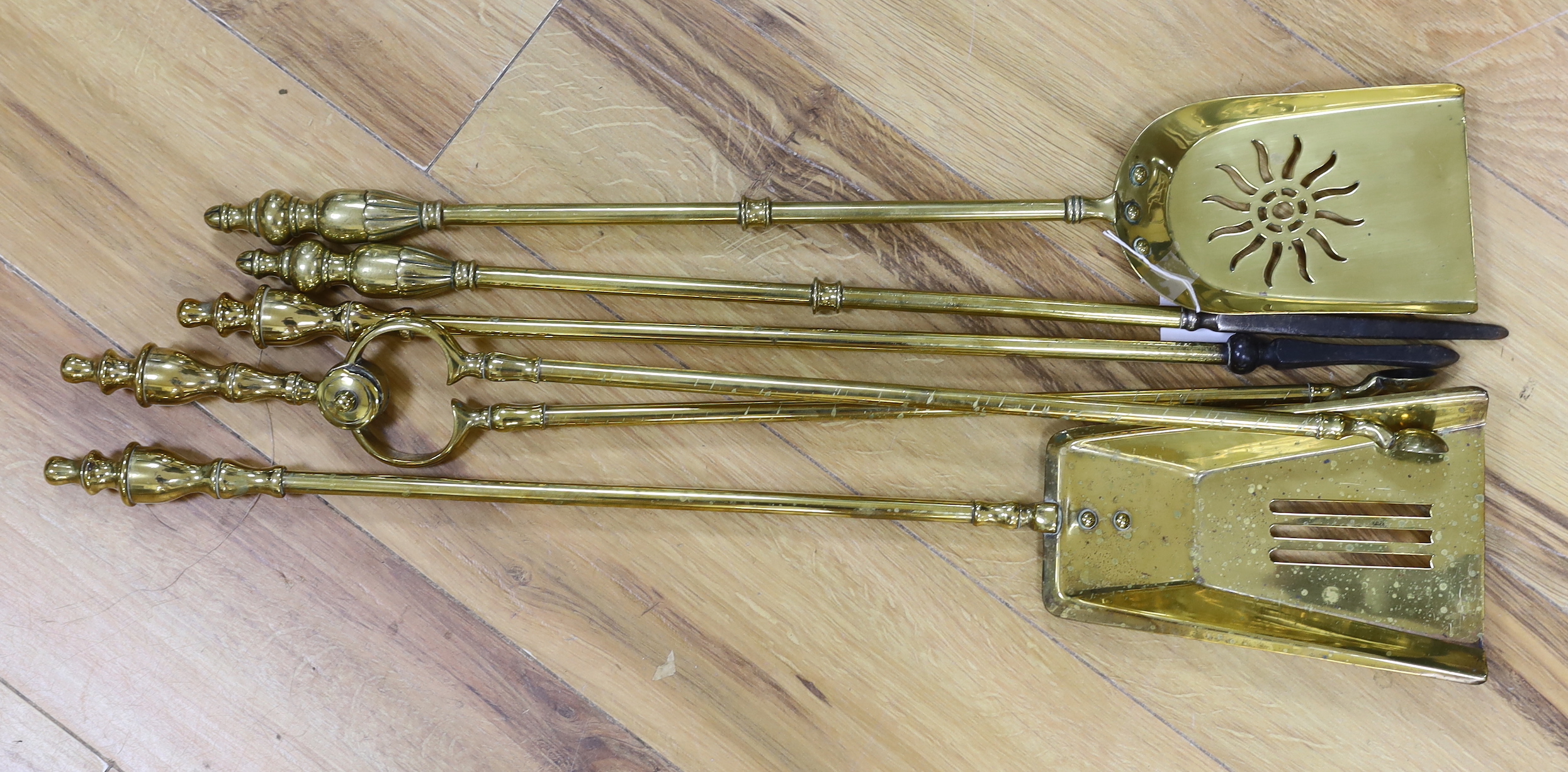 Brass five piece fire companion set, the largest 70cm in length